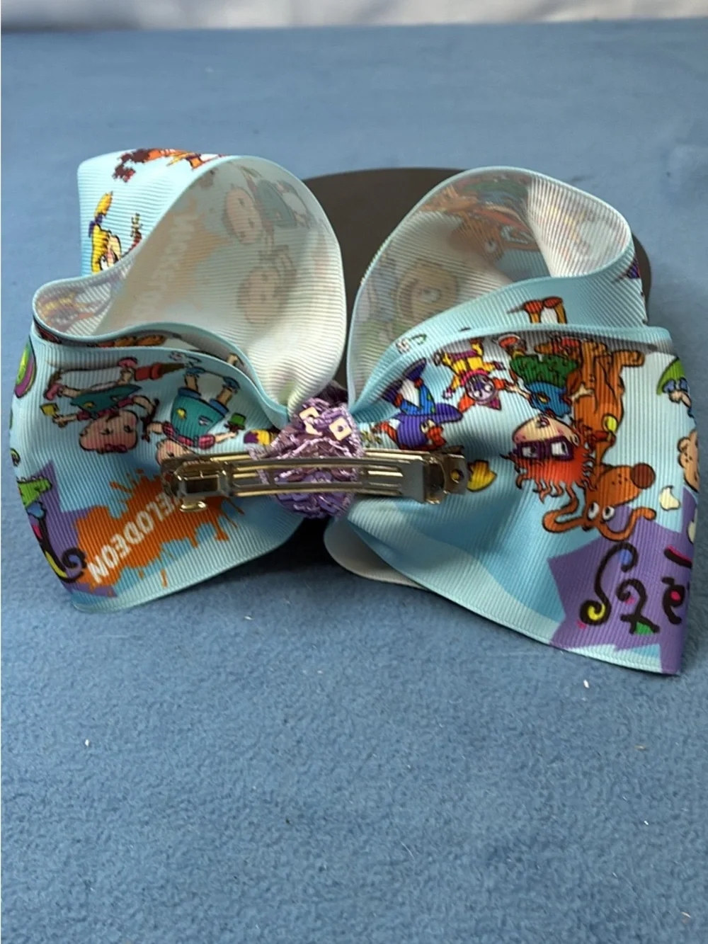 Nickelodeon Rugrats Print Light Blue Hair Bow with Purple Gem
